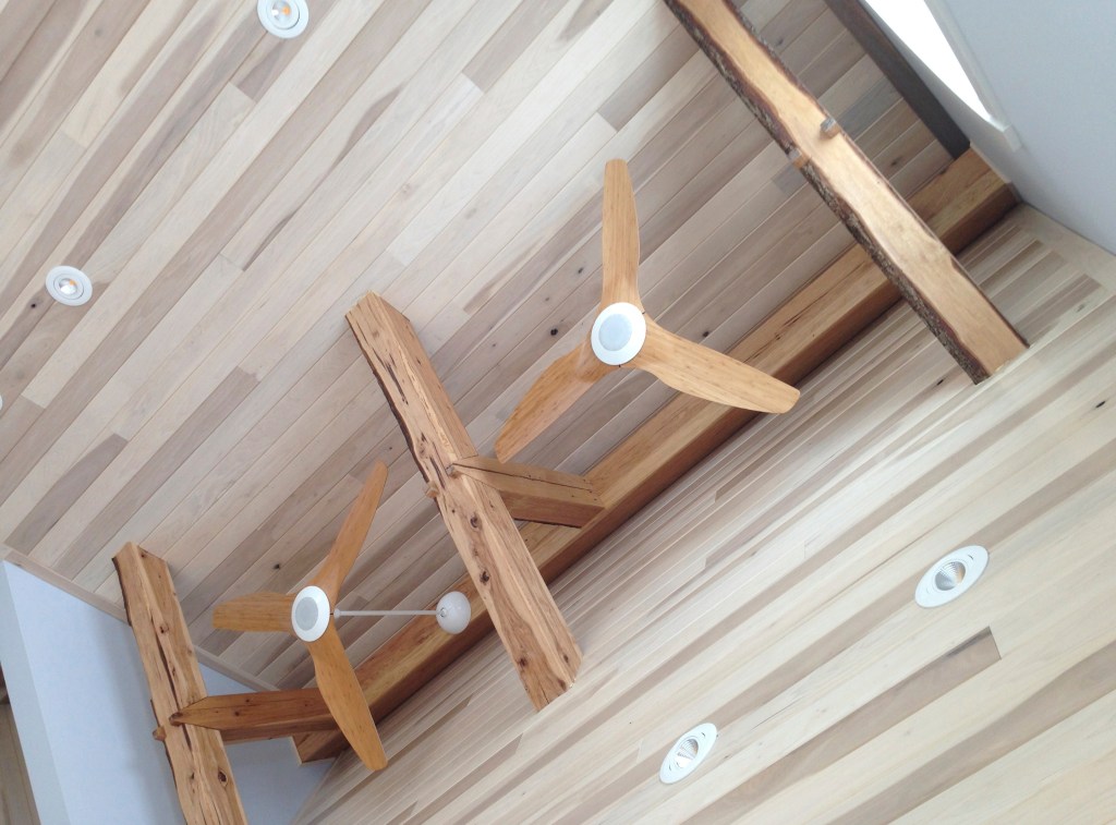 hickory beams hand hewn by skilled craftsman for beach house rafters