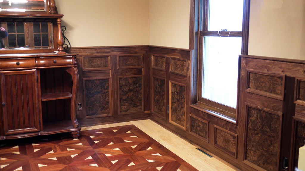 Walnut burled panel and laced wood flooring by skilled craftsman